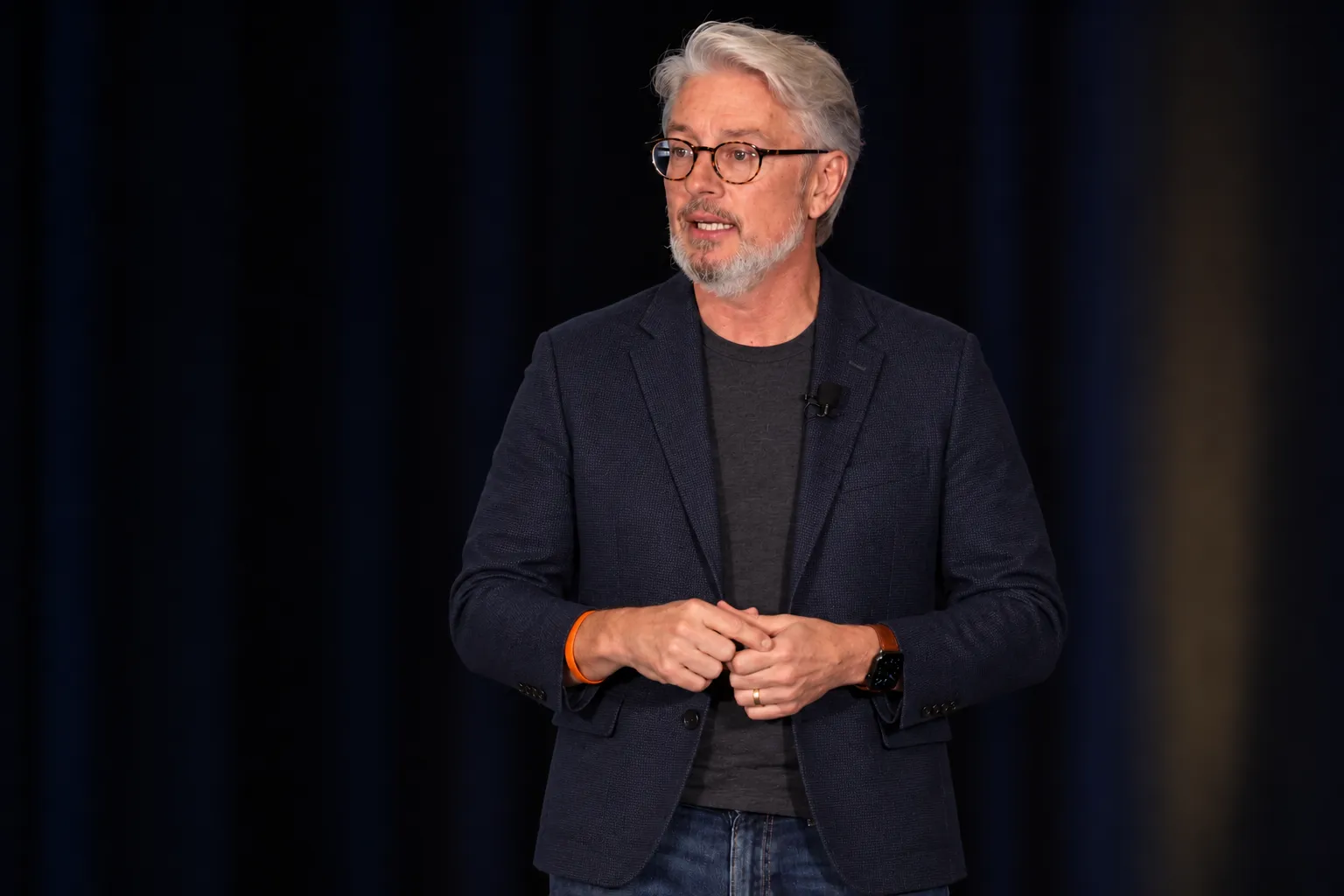 Dan Stewart speaking on stage